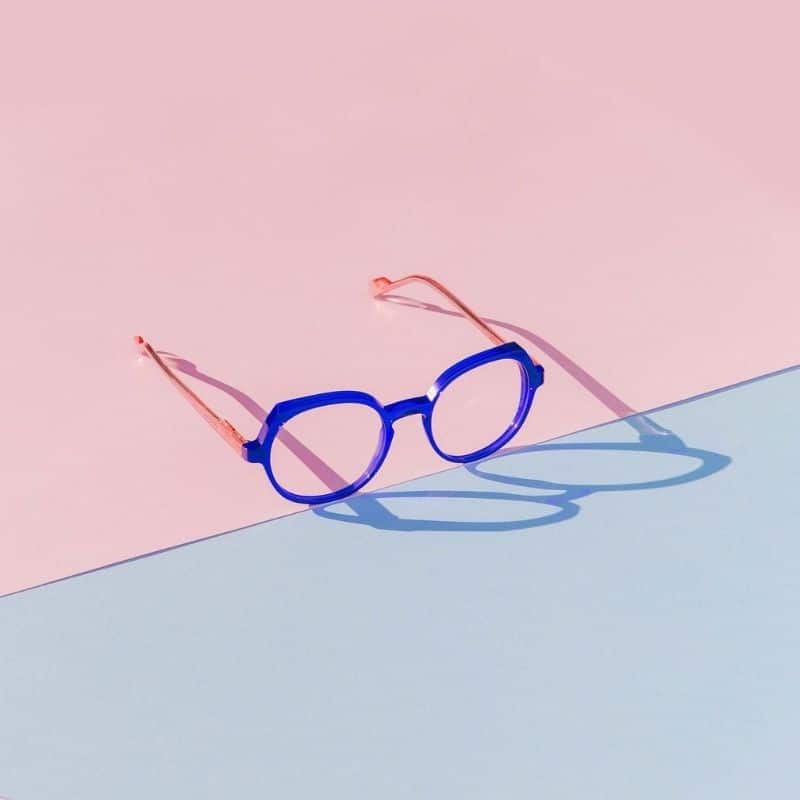 Purple acetate frame on a blue and pink background. Model Bunny