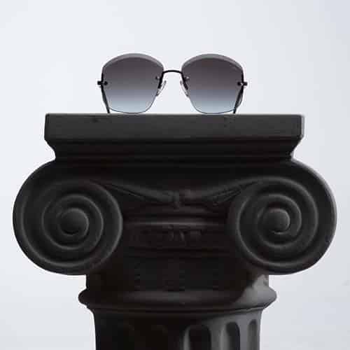 Cazal sunglasses on a grecian pedestal.