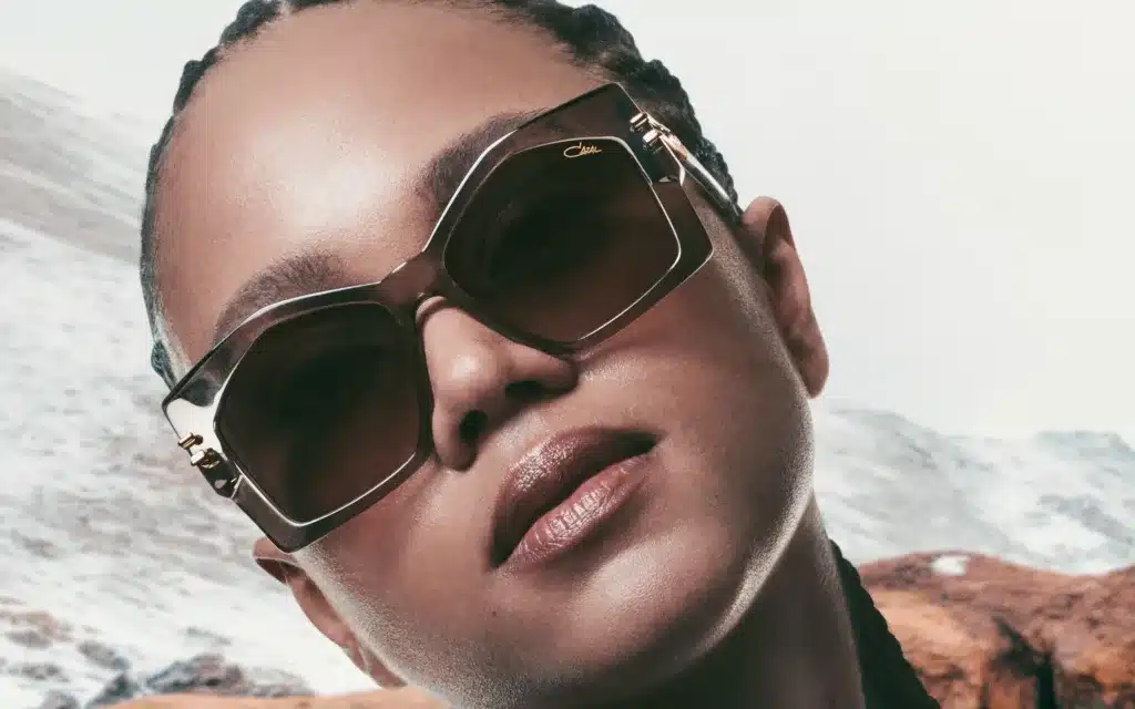A female black model wears Cazal MOD 5014 frames.