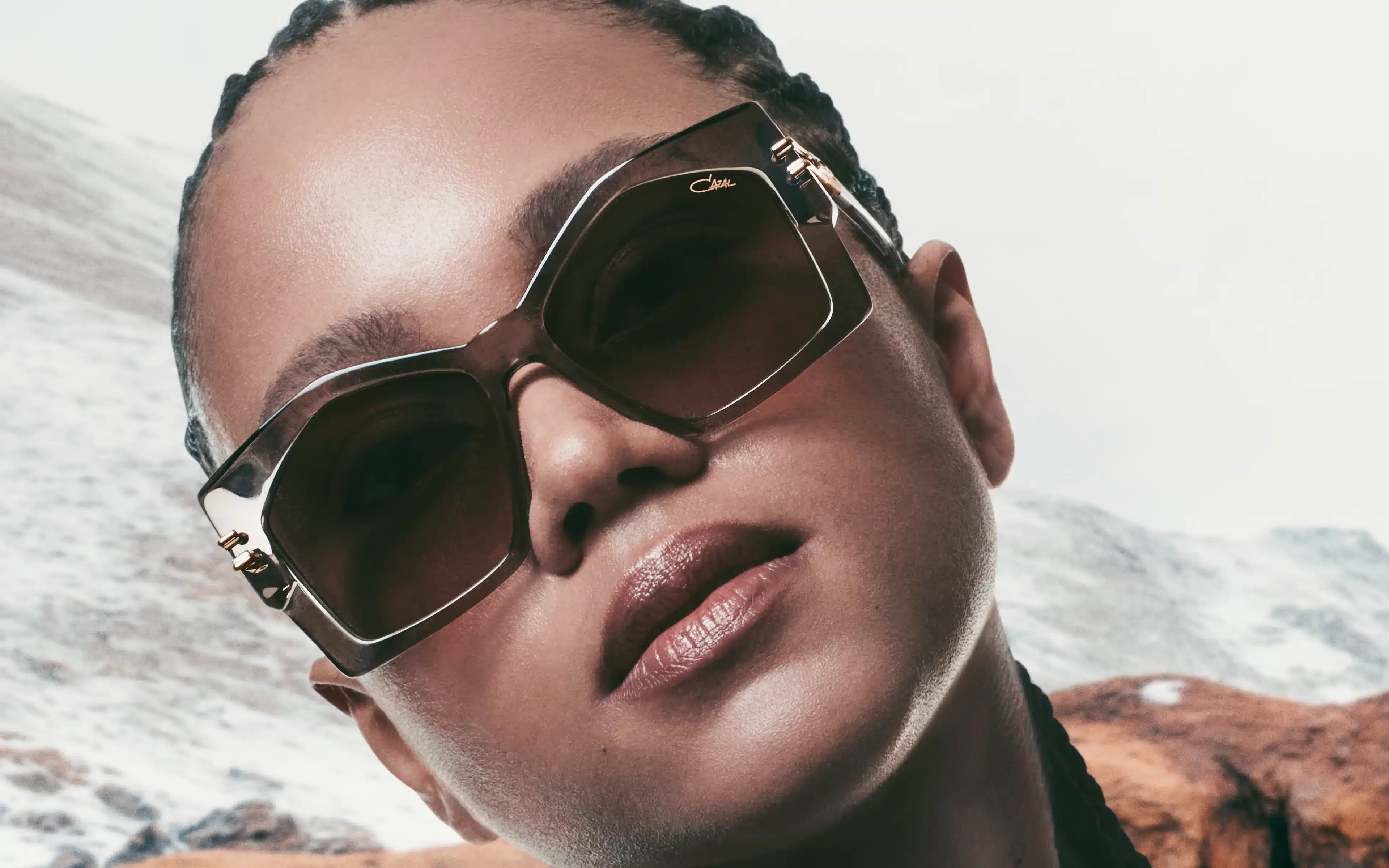 A female black model wears Cazal MOD 5014 frames.